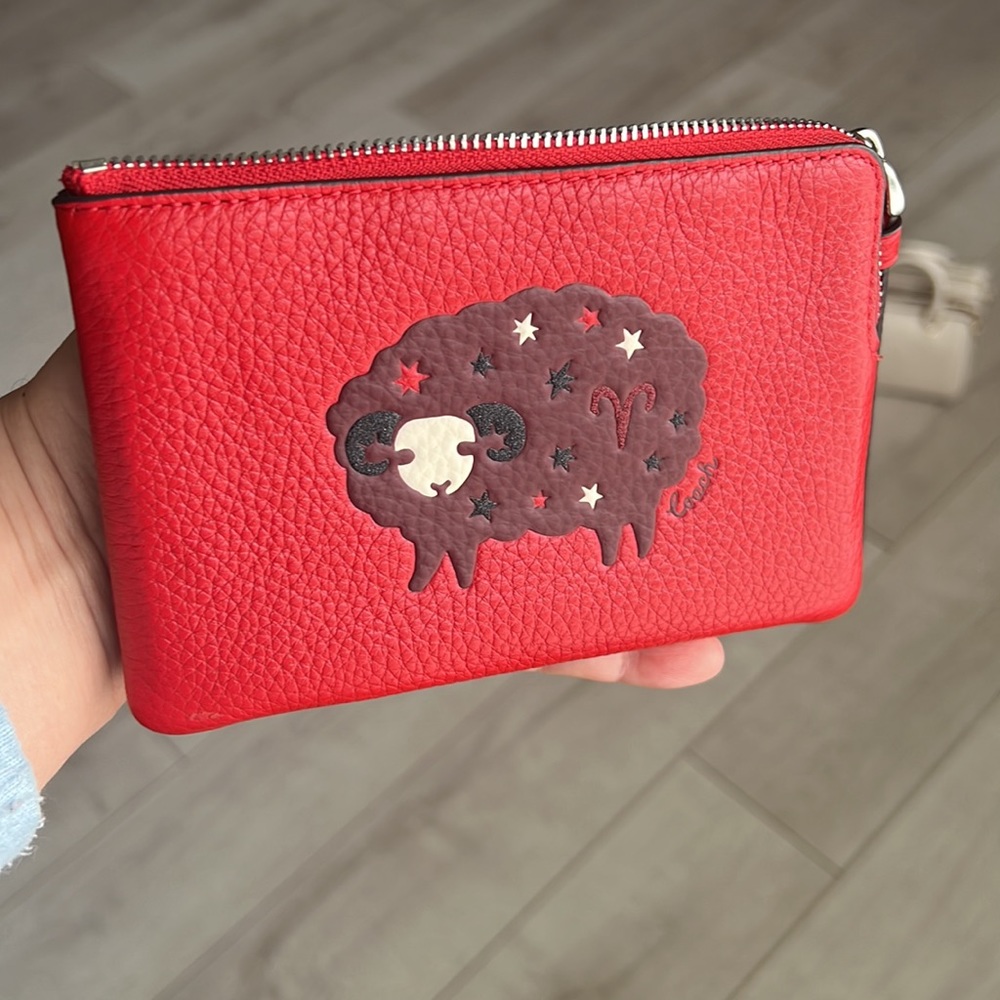Coach Corner Zip Wristlet With Aries